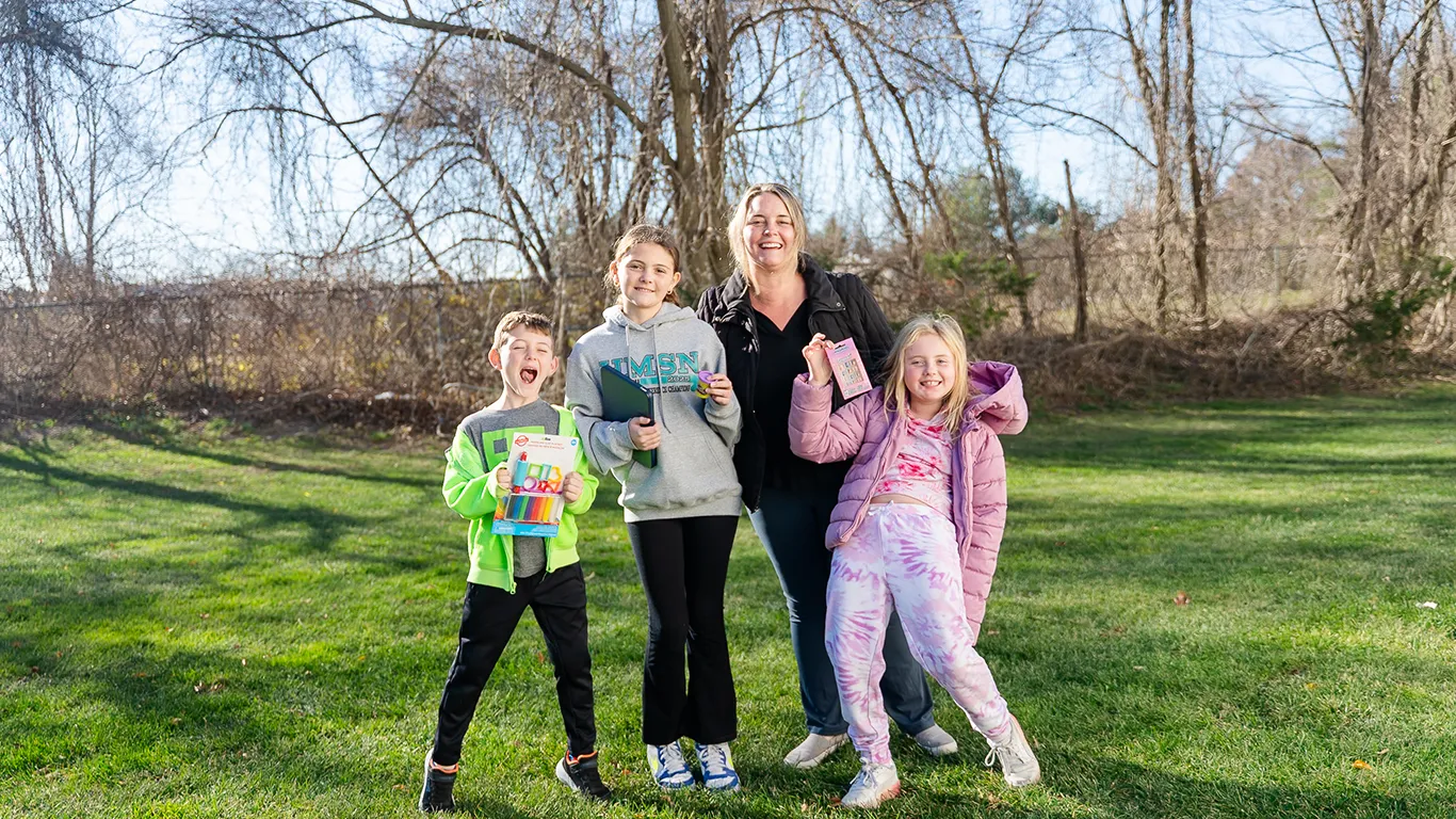 A happy family after treatment at Howell Pediatric Dentistry