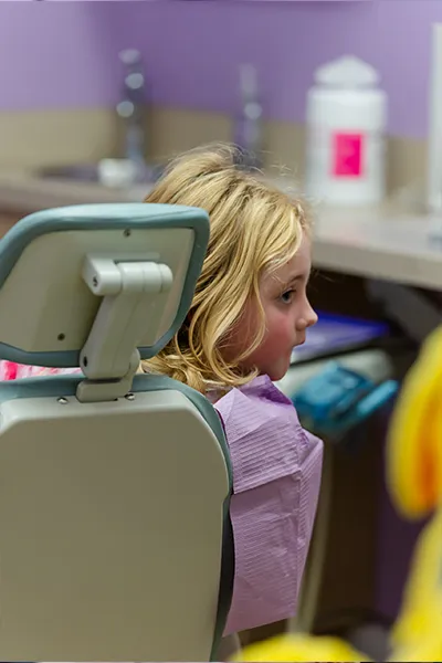 Thumb and Pacifier Habits – Howell Pediatric Dentistry A patient waiting in dental chair to start the check up process by one of the dental hygienist