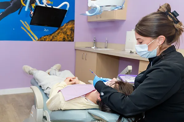 Dental Sealants for Children – Howell Pediatric Dentistry A patient undergoing sealant treatment at Howell pediatric dentistry